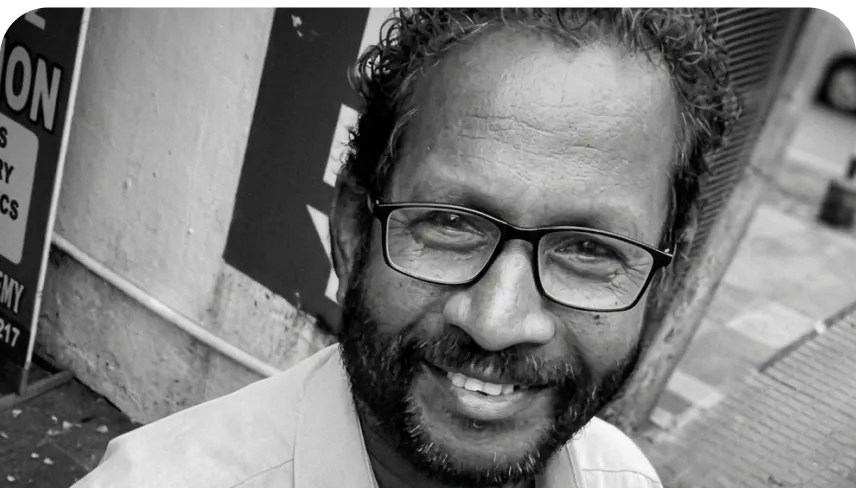 Black-and-white portrait of Raju